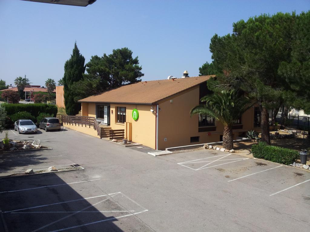 Campanile Perpignan Sud Hotel Bagian luar foto