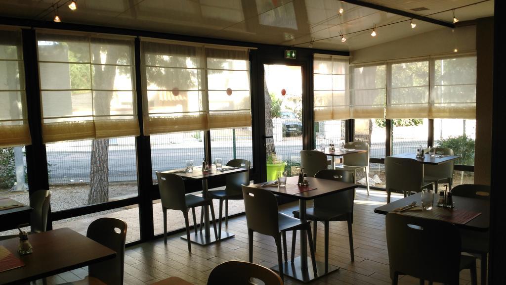Campanile Perpignan Sud Hotel Bagian luar foto